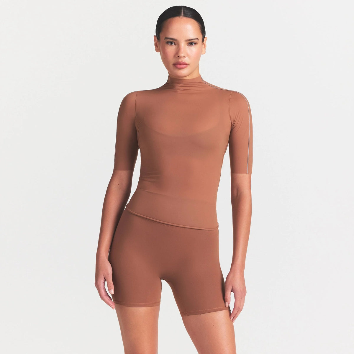 NikeSKIMS WEIGHTLESS LAYERS MOCK NECK SHORT SLEEVE T-SHIRT | CAROB BROWN