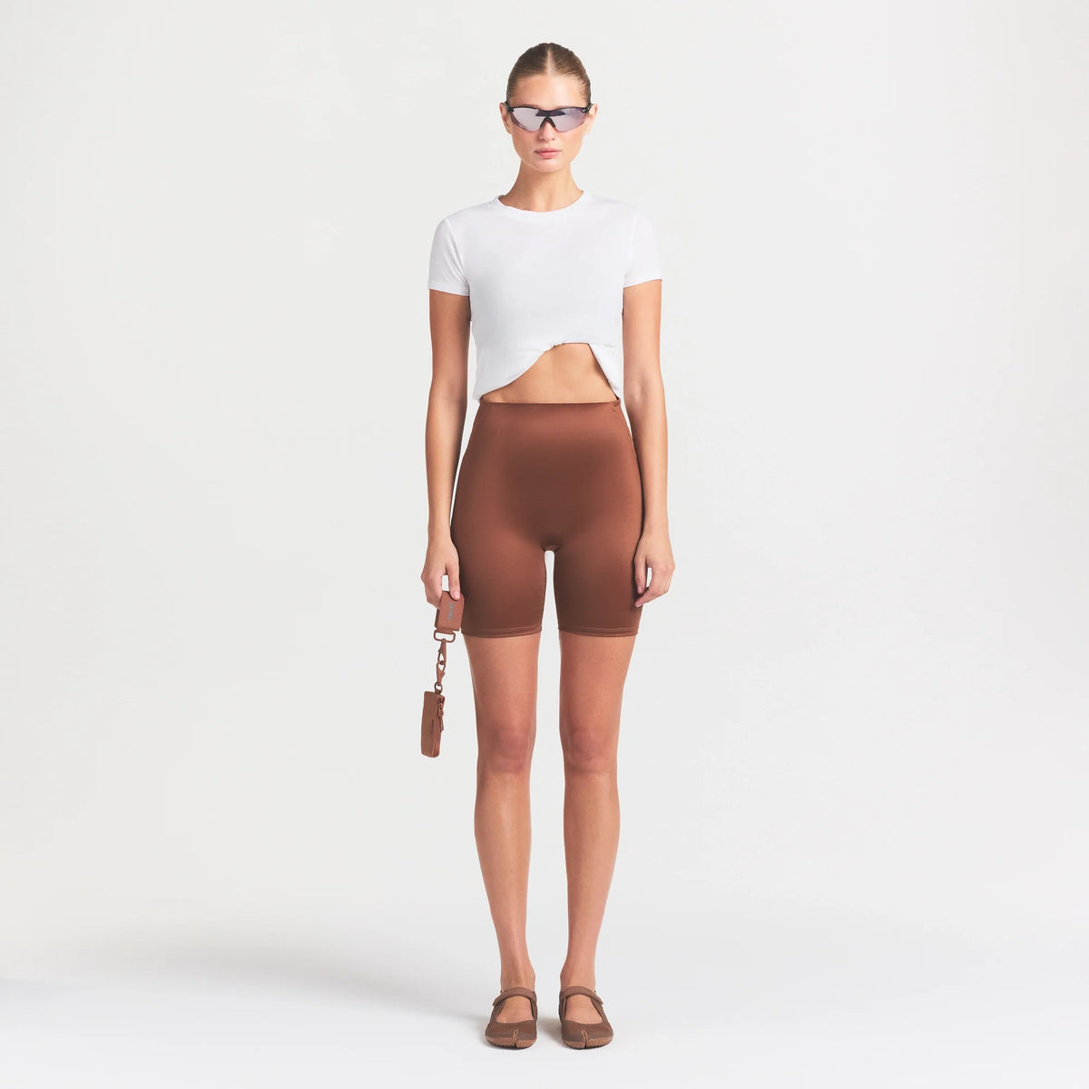 NikeSKIMS SATIN SHINE BONDED WAIST 7" BIKER SHORT | CAROB BROWN